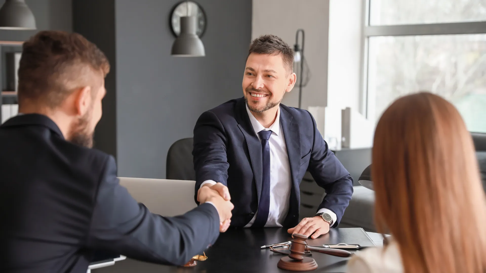 Advisor shaking hand.
